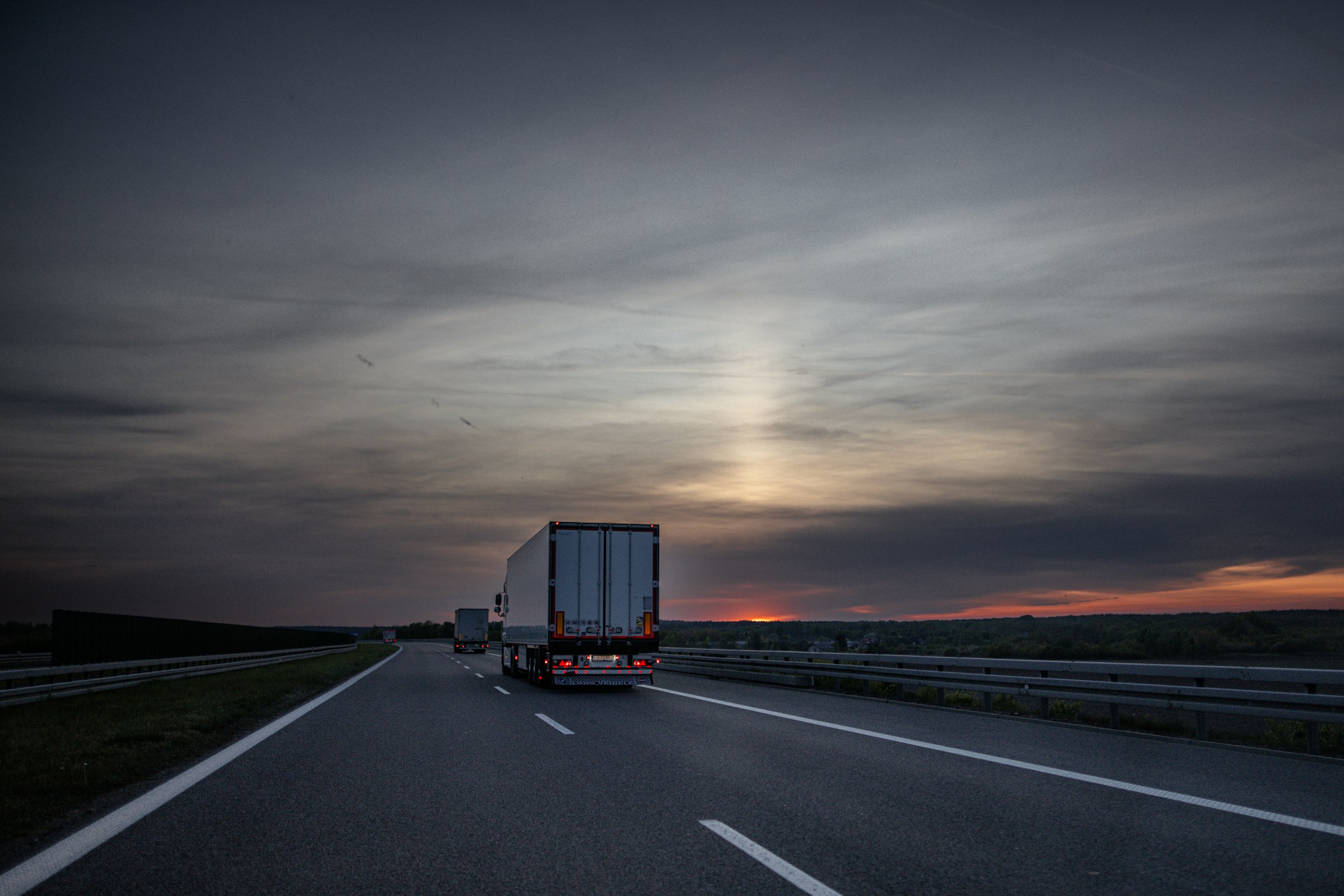 Freight truck on the highway at dusk